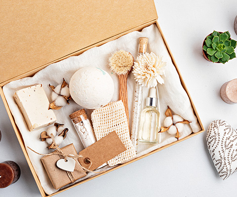 gift box containing bath products including a bath bomb soap lotion and natural decor five essential items for relaxation and self care